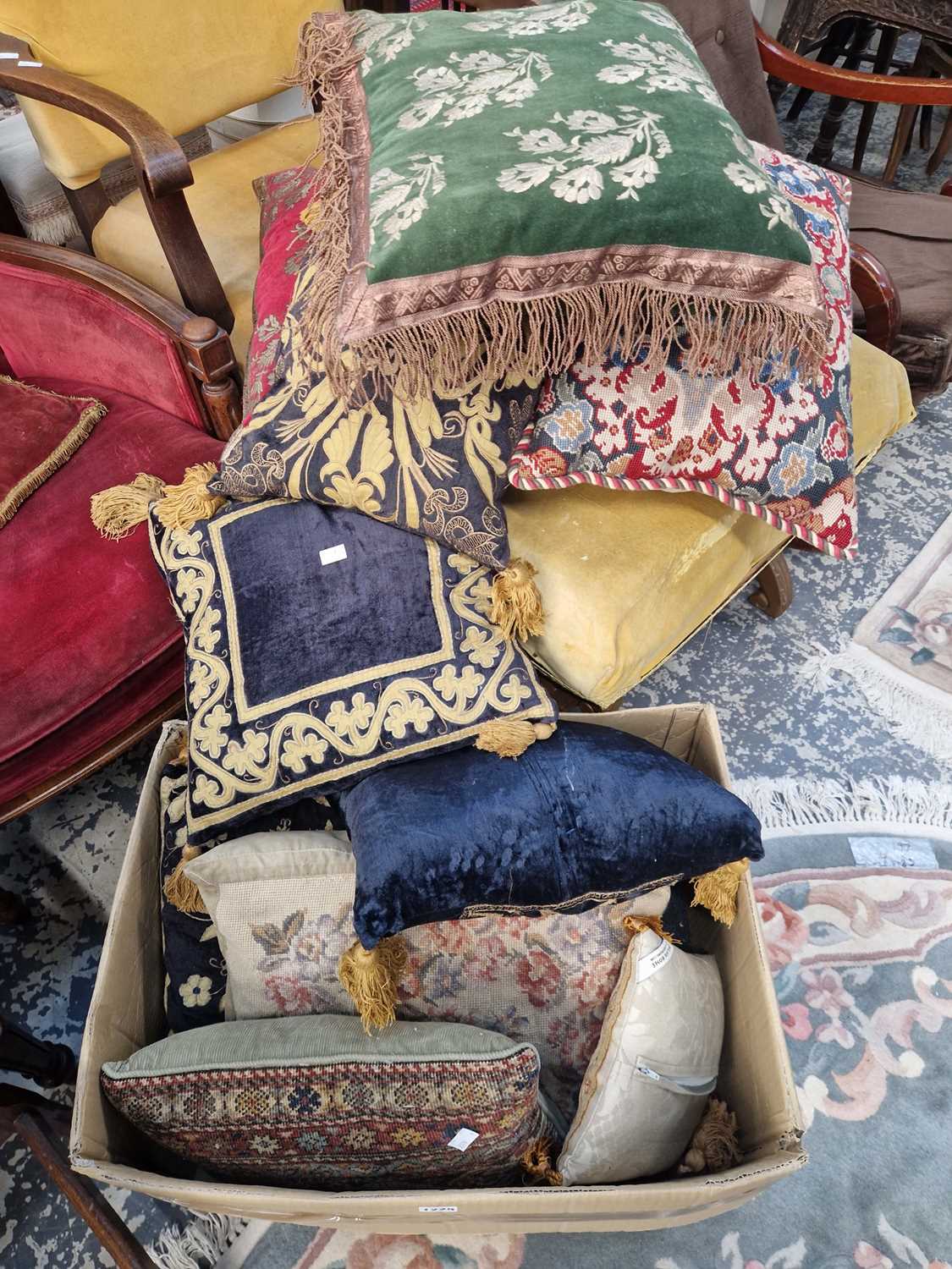 Lot 1225 - A good selection of throw cushions upholstered...