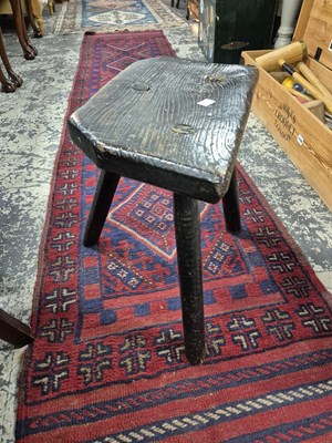 Lot 1249 - Two antique rustic milking stools.