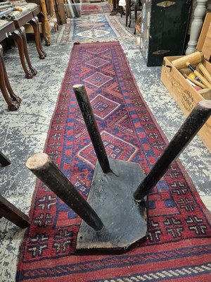 Lot 1249 - Two antique rustic milking stools.