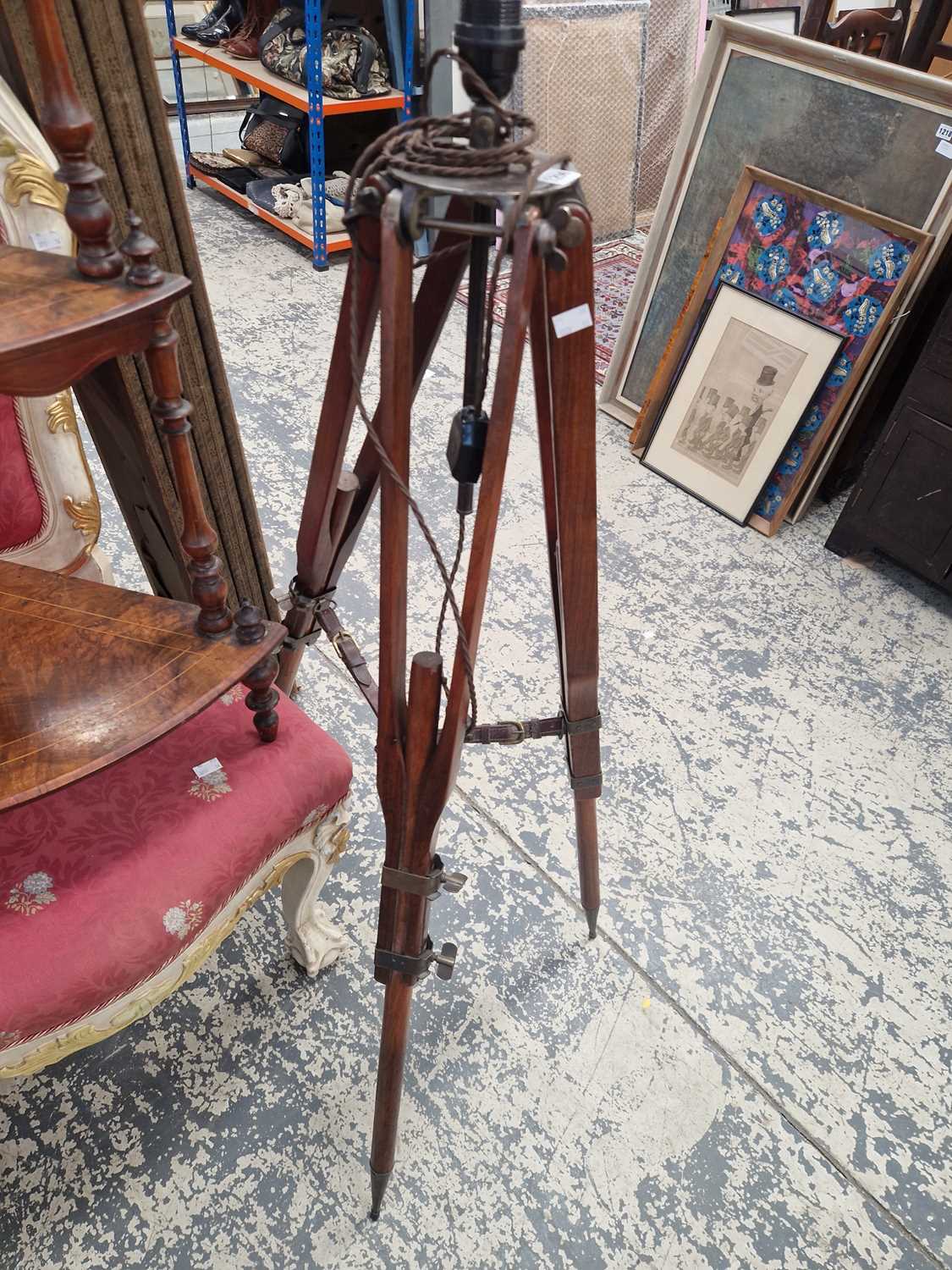 Lot 1256 - An interesting tripod base standard lamp.