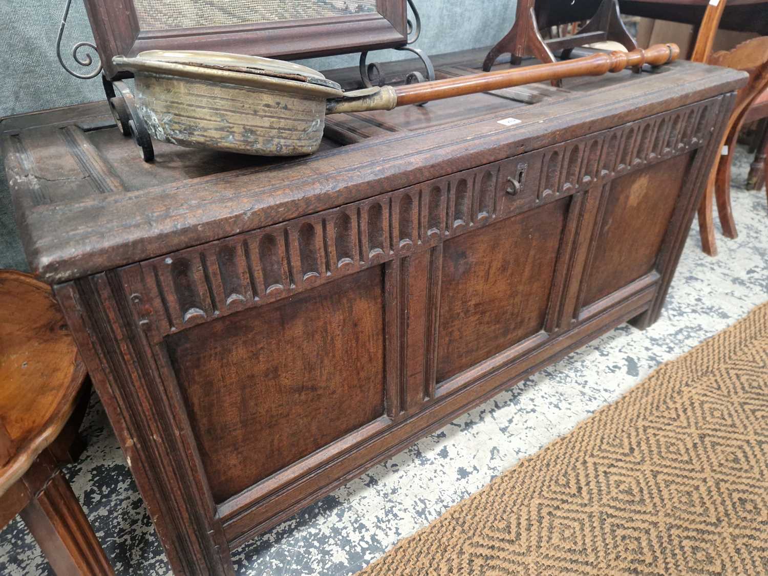 Lot 1262 - An 19th century oak coffer with three panel...