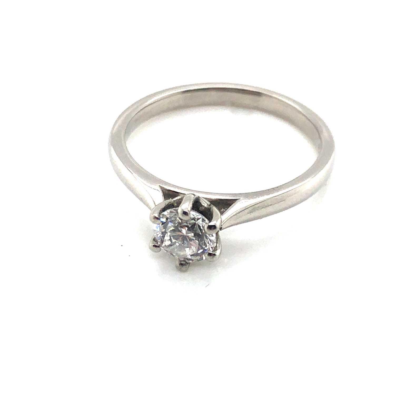 Lot 91 - A hallmarked platinum diamond solitaire ring...