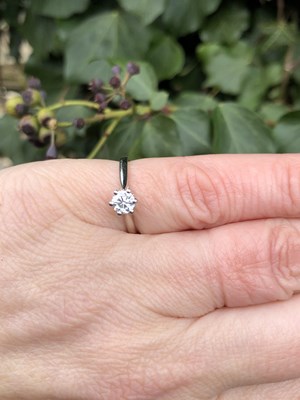 Lot 91 - A hallmarked platinum diamond solitaire ring...