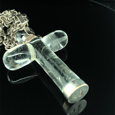 Lot 122 - Gucci. A vintage large glass cross with a...