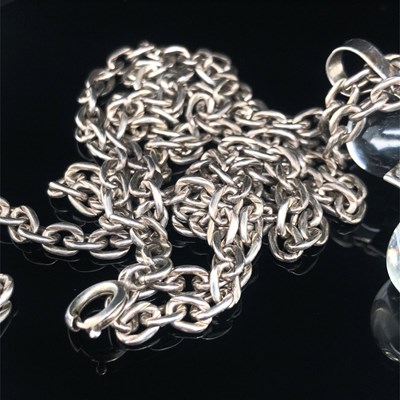 Lot 122 - Gucci. A vintage large glass cross with a...