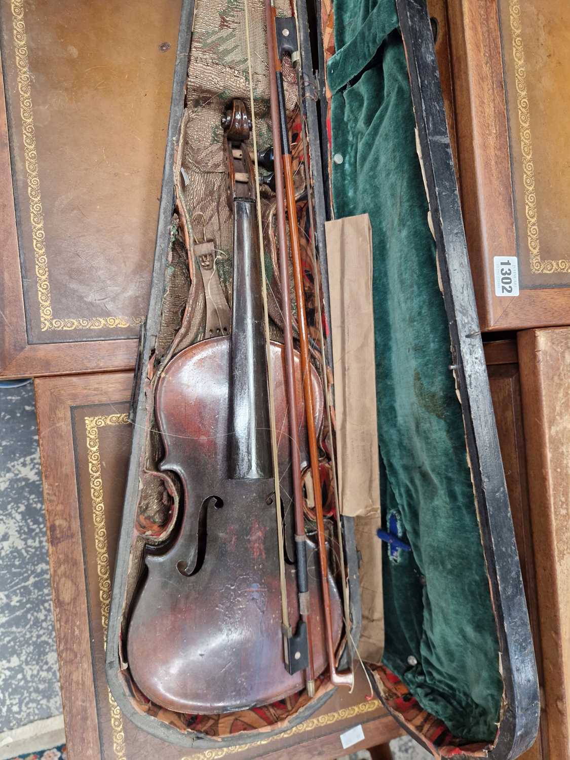 Lot 1303 - An antique violin in pine case. LOB 37 cm
