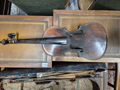 Lot 1303 - An antique violin in pine case. LOB 37 cm