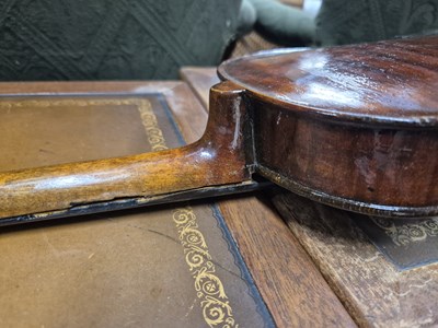 Lot 1303 - An antique violin in pine case. LOB 37 cm