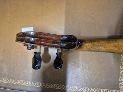 Lot 1303 - An antique violin in pine case. LOB 37 cm