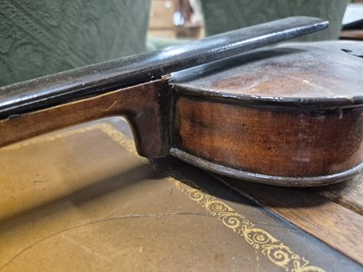 Lot 1303 - An antique violin in pine case. LOB 37 cm