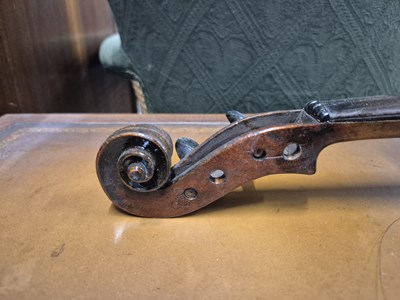 Lot 1303 - An antique violin in pine case. LOB 37 cm