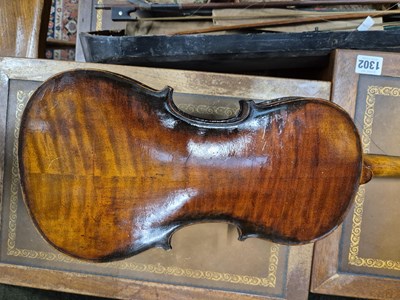 Lot 1303 - An antique violin in pine case. LOB 37 cm