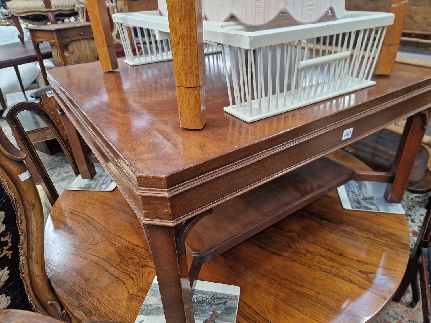 Lot 1307 - A large mahogany coffee table.