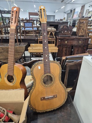 Lot 1315 - Three acoustic guitars; two trombones; several...