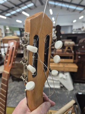 Lot 1315 - Three acoustic guitars; two trombones; several...