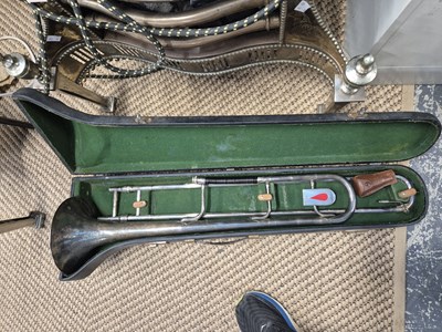 Lot 1315 - Three acoustic guitars; two trombones; several...
