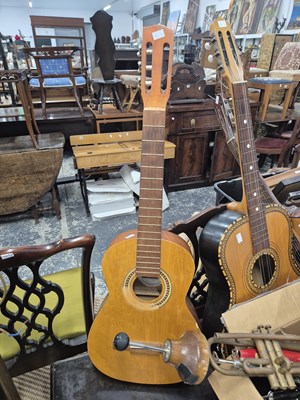 Lot 1315 - Three acoustic guitars; two trombones; several...