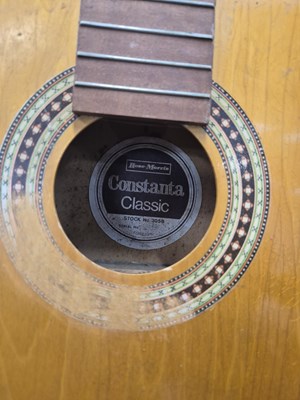 Lot 1315 - Three acoustic guitars; two trombones; several...