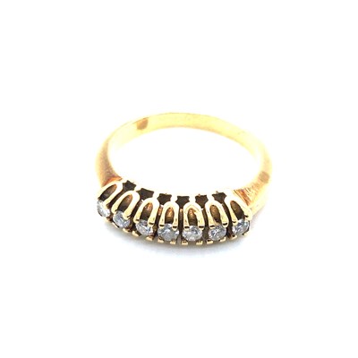 Lot 146 - A seven-stone diamond half eternity style ring,...