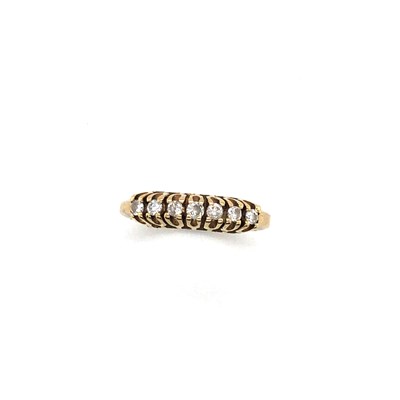 Lot 146 - A seven-stone diamond half eternity style ring,...