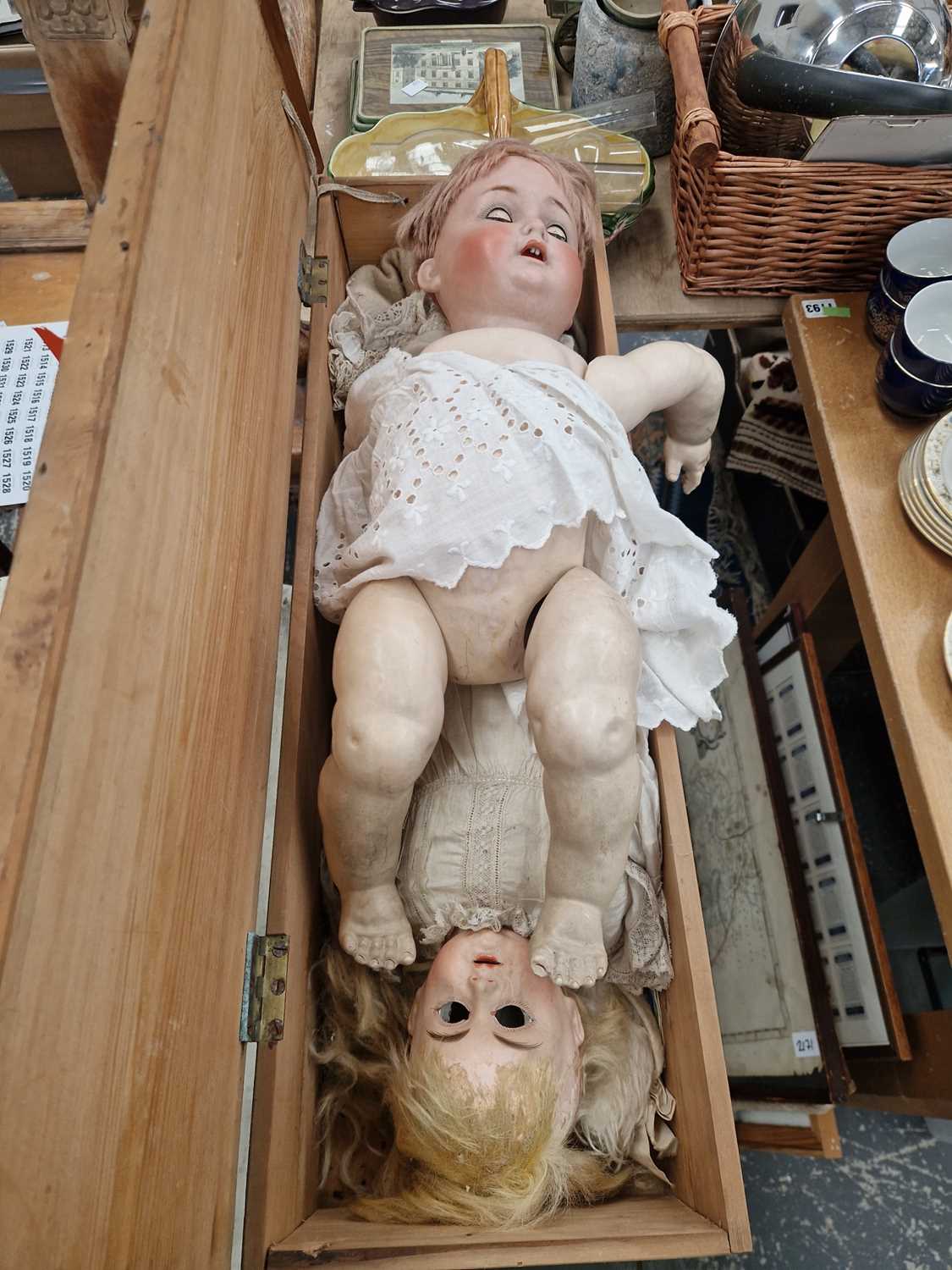 Lot 2173 - two large antique bisque head dolls.