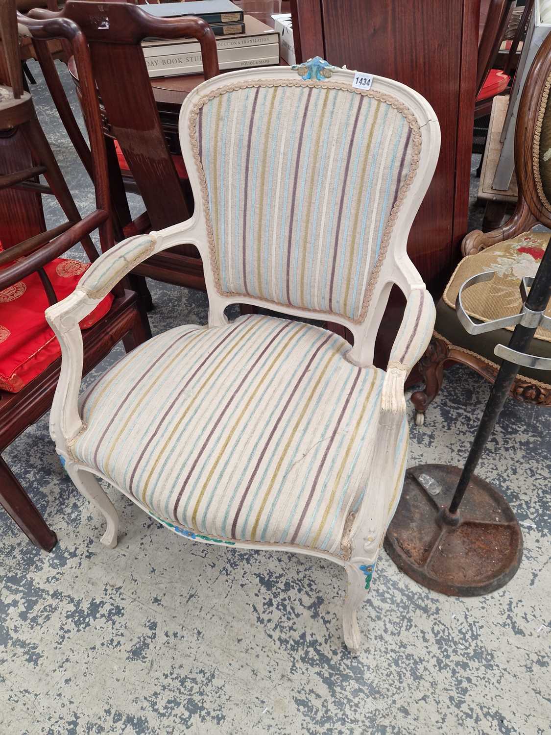 Lot 1434 - A French painted show frame armchair.