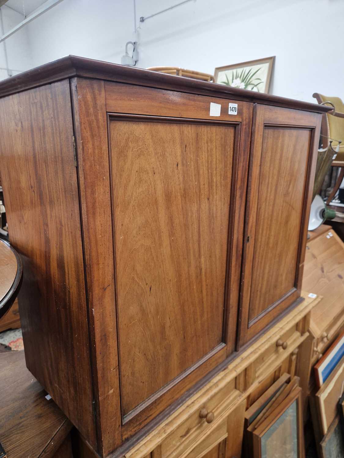 Lot 1470 - A Victorian mahogany two door small cabinet. H...