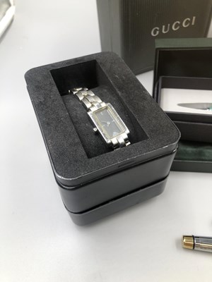 Lot 174 - A vintage Gucci watch reference number 6400L ...