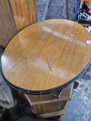 Lot 1487 - An art deco oval coffee table. W 76 D 51 H 42 cm