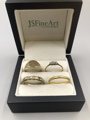 Lot 196 - Four gold rings including a 22ct gold wedding...