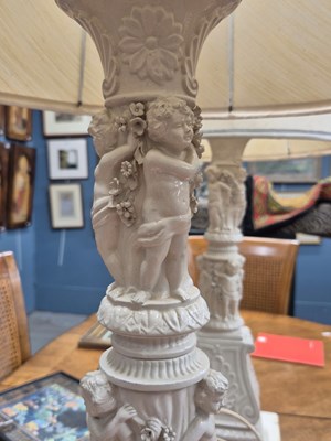 Lot 938 - A pair of porcelain large table lamps with...