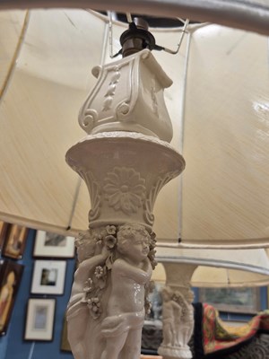 Lot 938 - A pair of porcelain large table lamps with...