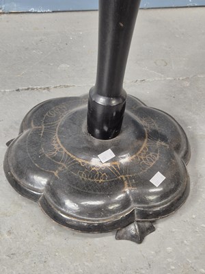 Lot 940 - A Victorian papier mache tilt-top table.