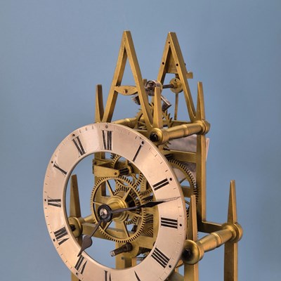 Lot 237 - A fusee skeleton clock under a dome on an...