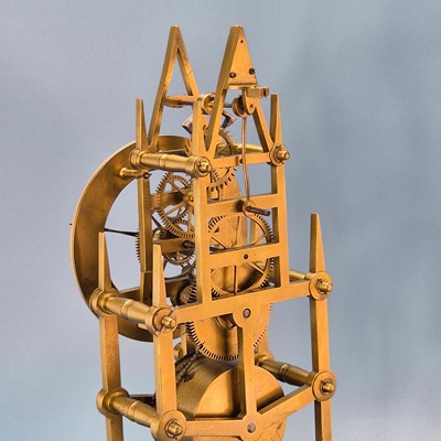 Lot 237 - A fusee skeleton clock under a dome on an...
