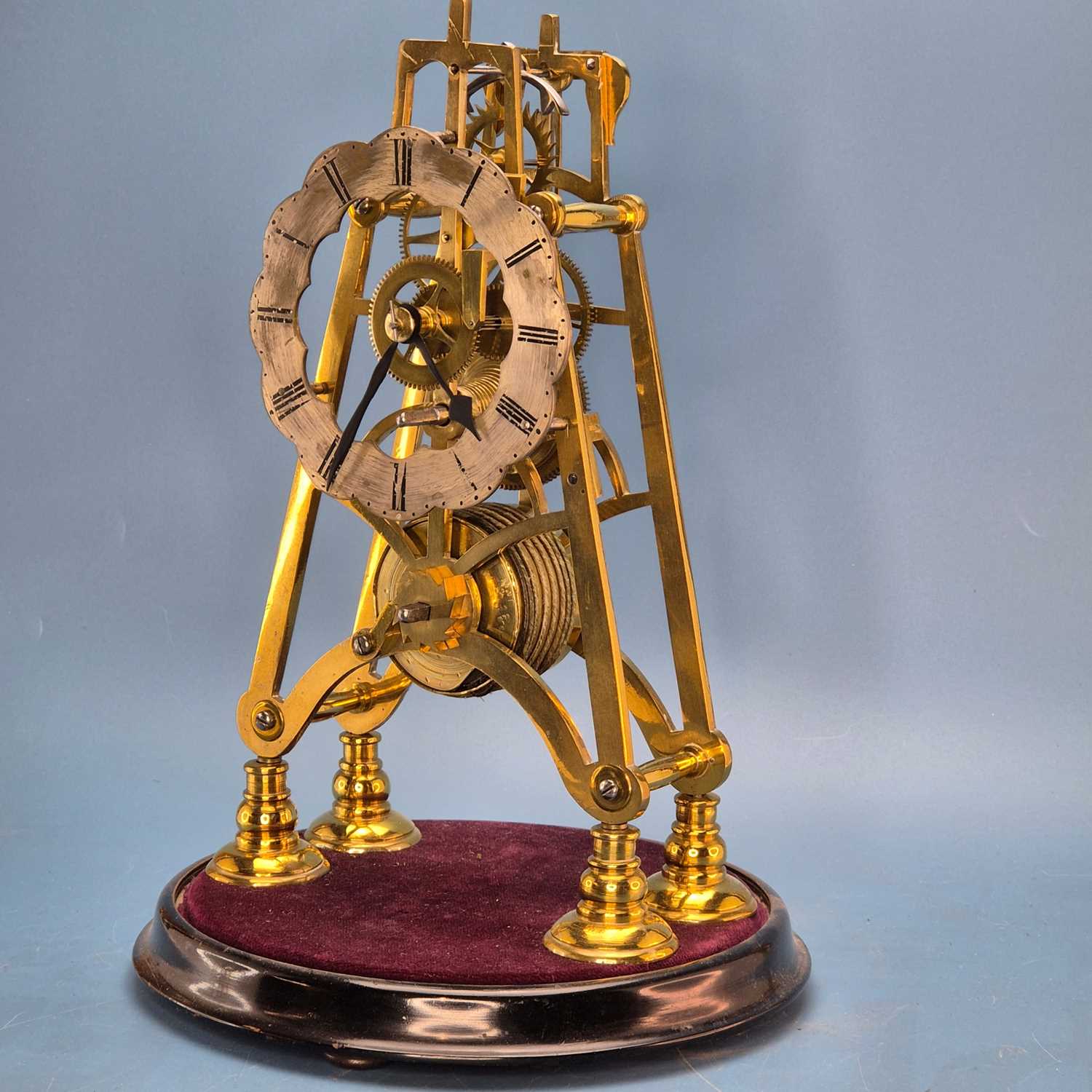 Lot 243 - A fusee skeleton clock under a glass dome, the...