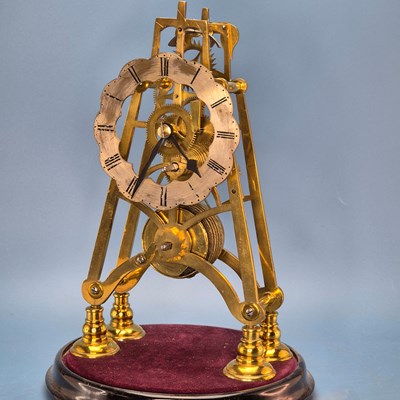 Lot 243 - A fusee skeleton clock under a glass dome, the...