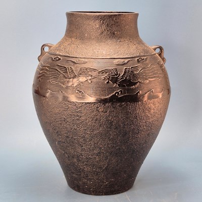 Lot 333 - A Chinese cast iron two handled vase with a...