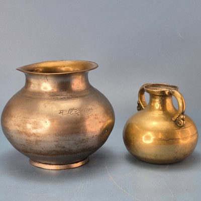 Lot 333 - A Chinese cast iron two handled vase with a...