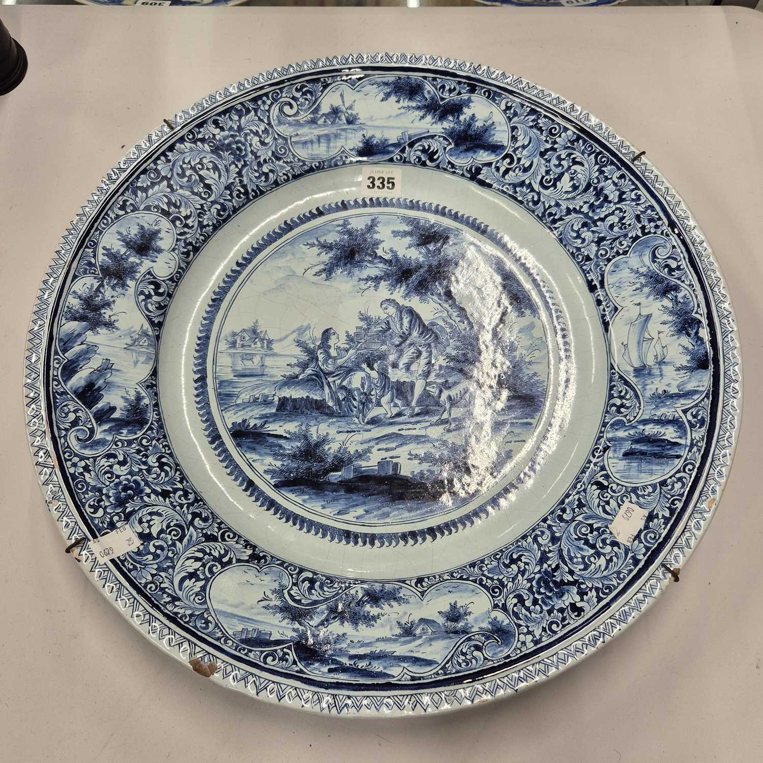 Lot 335 - A Dutch Delft blue and white wall charger...