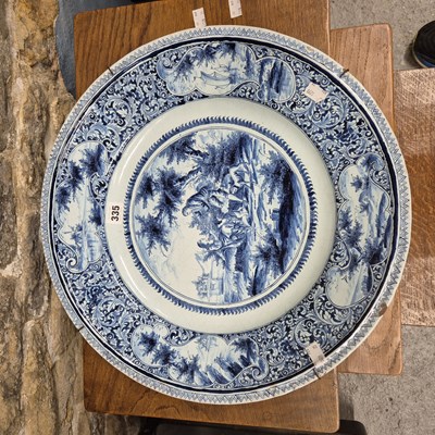 Lot 335 - A Dutch Delft blue and white wall charger...
