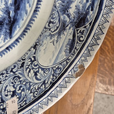 Lot 335 - A Dutch Delft blue and white wall charger...