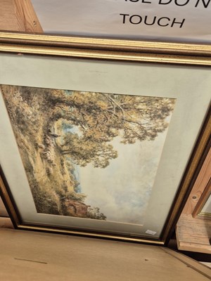 Lot 259 - A sepia tinted photograph of a shoreline and...