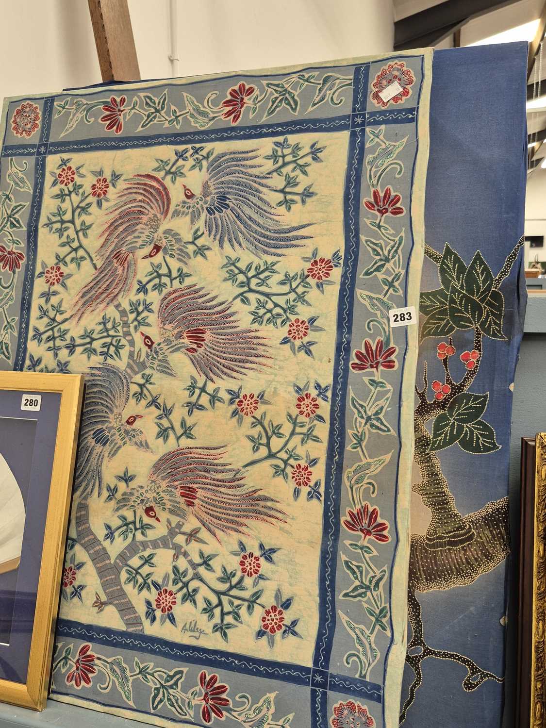 Lot 283 - Two far eastern textile pictures.