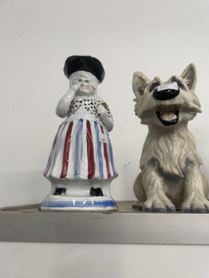 Lot 1119 - A lady snuff taker toby jug, two white scottie...
