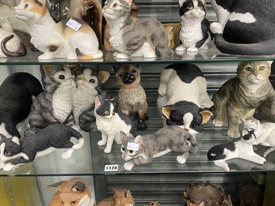 Lot 1128 - A collection of cat figurines by the Leonardo...