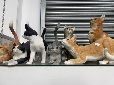 Lot 1128 - A collection of cat figurines by the Leonardo...