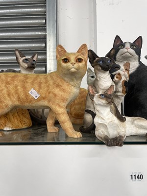 Lot 1140 - A collection of cat figurines by Leonardo...
