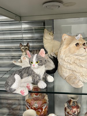 Lot 1140 - A collection of cat figurines by Leonardo...