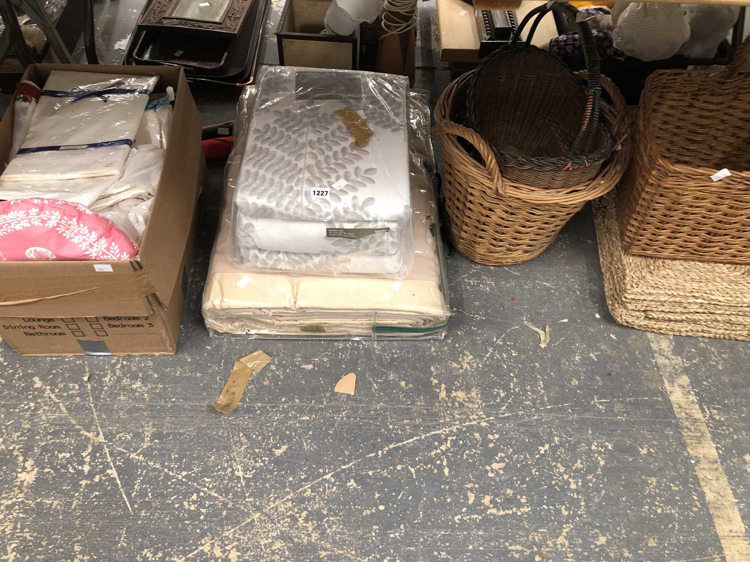 Lot 1227 - Table linen, blankets, baskets, and woven rush...